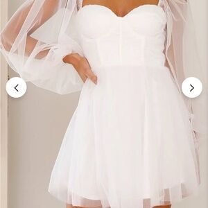 Elegant White Mini Dress with Sheer Sleeves